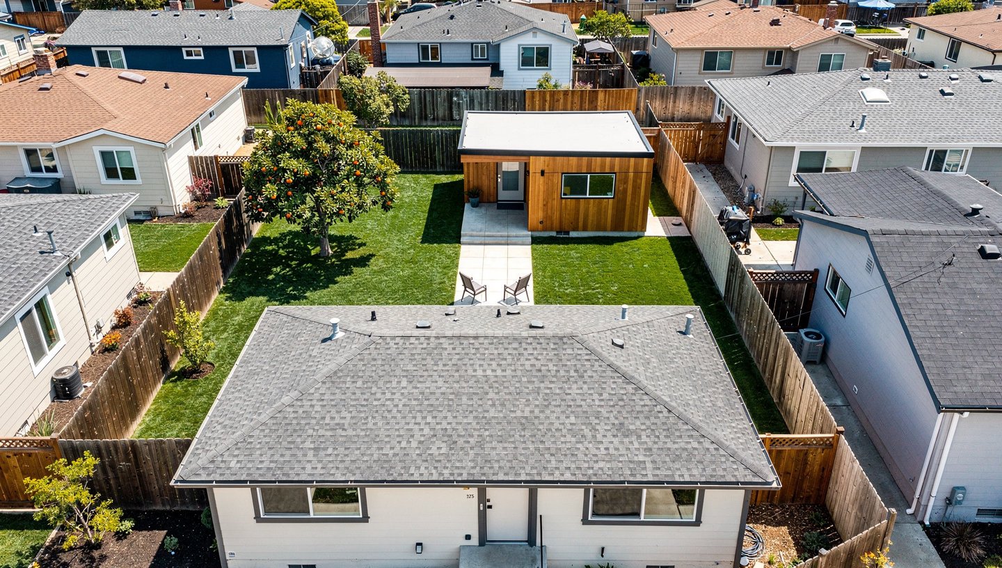 Modern ADU construction showing proper setback distances from property lines in Silicon Valley neighborhood